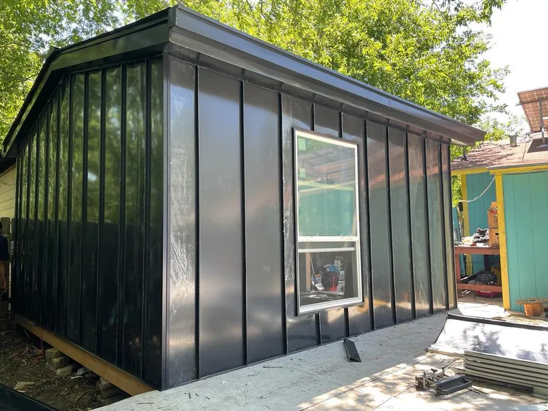 Black standing seam metal wall panels for Metal Roof Installation in Saratoga Springs